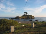 A Nice Harbor Lighthouse On A Small Islsnd.  My panorama of this park is now posted in ZMM Part III Panoramas, a companion album. Somehow we will work this nice harbor lighthouse, including it's small off shore island, into the panorama.  A Coast Side Harbor Park, just West of downtown Crescent City, CA.  (Photo = 115-1567_IMG.JPG)