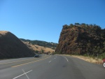 This Cut In the Rock Was Not made By the California Highway Department. The Russian River Got Here First! This River Over Past Eons, Managed to Cut This Wonderful Valley Down From the Surrounding Hills. The Highway Followed the River Through This Gap.  This Valley and the Russian River started in the mountains well North of Ukiah, flows through Mendoceno Lake, and continues South, half way to San Francisco Bay.  Several miles South of Hopland, CA.  (Photo = 117-1770.JPG WayPt = 480i !0471ft Photo at ~7 mi SouthSouthEast of Hopland and 2 mi  South of WayPt = 479 0470ft)
