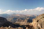  Views in the Narrator's High Country! (Continued) After Going Down About Five Switch-backs, We Are Rewarded With This Rocky Scene Looking Over Upper Rock Creek Canyon.    Note the complete absence of soil around the barren rocks and gravel pushed up by the road construction.   Beartooth Pass, MT.  ************************************  (Photo = Summer2006 0120 ...... ZMM Page = 111 ...... WayPt =~146m ~10500ft)