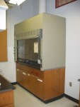 A Second Type of Energy Saving Chem Lab Hood Used In The USCA Science Building.  If you look carefully, you will see that the front of the hood is covered with a glass pull-down panel. This hood blower fan is regulated so, the lower the glass panel is pulled down, the slower the blower tries to move the air. Net result is less noise and less energy consumption and less loss of heated (or cooled) room air.  Science Building,  USCA Campus, Aiken, SC.  ************************************  (Photo = 4989 ...... WayPt = `000 |w|' 420 ft)