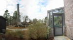 A General View of South Side of Science Building Showing: 1) Building Exhaust Air Cylindrical Tower, 2) Vehicle Area, and 3) Side Entrance to Biology Dept Greenhouse.   To see photos of the beautiful greenhouse plant collection, click here.  Science Building,  USCA Campus, Aiken, SC.  ************************************  (Photo = 5172+2iscz ...... WayPt = `000 |w|' 420 ft)