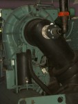Close-Up of the Centrifugal Refrigerator Compressor.  The curved outline of this centrifugal pimp shell, with reinforcing ribs, is clearly seen curving around the black inlet pipe.  HVAC Equipment Room, Basement of Science Building, USCA Campus, Aiken, SC.  ************************************  (Photo = 5131BrtAdj ...... WayPt = `000 |w|' 420 ft)