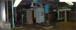 Wide View Showing general View of What Is Seen At the Opposite End of the Waste Heat Sorption Refrigerator (Tan box). Hidden behind the Pipes and Grey Switch Box are the previously mentioned: 1) Diesel Engine Co-Generator, 2) Air Conditioner Chilled Water Pipes, and 4) Centrifugal Refrigerator Compressor.  The next four photos will again show close-up views of this equipment but from the "other end",  HVAC Equipment Room, Basement of Science Building, USCA Campus, Aiken, SC.  ************************************  (Photo = 5159+3sc ...... WayPt = `000 |w|' 420 ft)