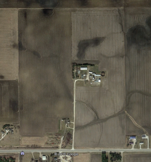  Another aerial picture, similar to previous though with the area in the upper left blue rectangle magnified 

Sarah's childhood home, farmstead, and farm. You can pick out the farm perimeter, within the large photo edge borders, which are farms of other owners.

Farm Only.PNG