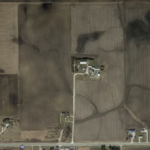  Another aerial picture, similar to previous though with the area in the upper left blue rectangle magnified 

Sarah's childhood home, farmstead, and farm. You can pick out the farm perimeter, within the large photo edge borders, which are farms of other owners.

Farm Only.PNG