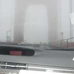 Continuing Along The Golden Gate Suspension Bridge, We Can See, Despite The Fog, A Good View Of The Giant Red Colored Bridge Support Pylon Coulmns.  

NOTE: A Pylon is the tower or vertical part of a suspension bridge, over which are draped, the giant support cables. 

File = DSC 0154 Resize602x400
