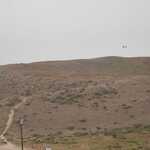 As We Drive Below The Sun Less Gloom Of A Uniform Overcast Of Coastal Fog, More Huge Coastal Sand Dune Is Seen 34 Seconds After The Previous Photo, As David Matos & Henry Gurr Drive, SouthSouthEast Along Rt-9 Towards Santa Cruse, C A. 

File = DSC 0318 Resize602x400
