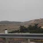 As We Drive Below The Sun Less Gloom Of A Uniform Overcast Of Coastal Fog, More Huge Coastal Sand Dunes Are Seen 16 Seconds After The Previous Photo, As David Matos & Henry Gurr Drive, SouthSouthEast Along Rt-9 Towards Santa Cruse, C A. 

File = DSC 0319 Resize602x400