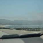 We See The Beach & Pacific Ocean Coast Line Of Santa Cruse Bay, 14 Min Before Arriving At A Safeway Grocery Store, Near Santa Cruse, CA.  

File = DSC 0322 Resize602x400