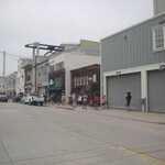 Looking Northwest Along Cannery Row Street, Two Minutes After The Previous Panorama, We Can See At The END Of The Street, The Building Of Monterey Bay Aquarium. The Front Entrance Is, Below And Slightly To The Left Of, The Two Tall Smoke Stacks.  

File = DSC 0339 Resize602x400